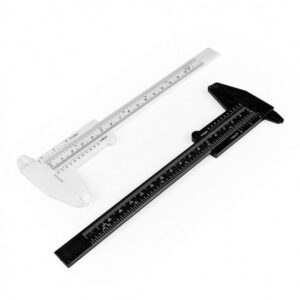 Calibre para medida de simetría de cejas.